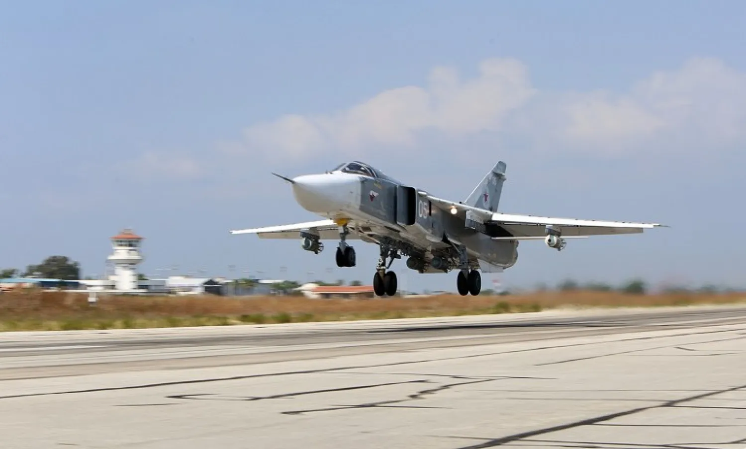  File: A Russian Sukhoi Su-24 bomber taking off from the Hmeimim air-base in the Syrian province of Latakia, October 3, 2015. (AFP/Komsomolskaya Pravda/Alexander Kots)