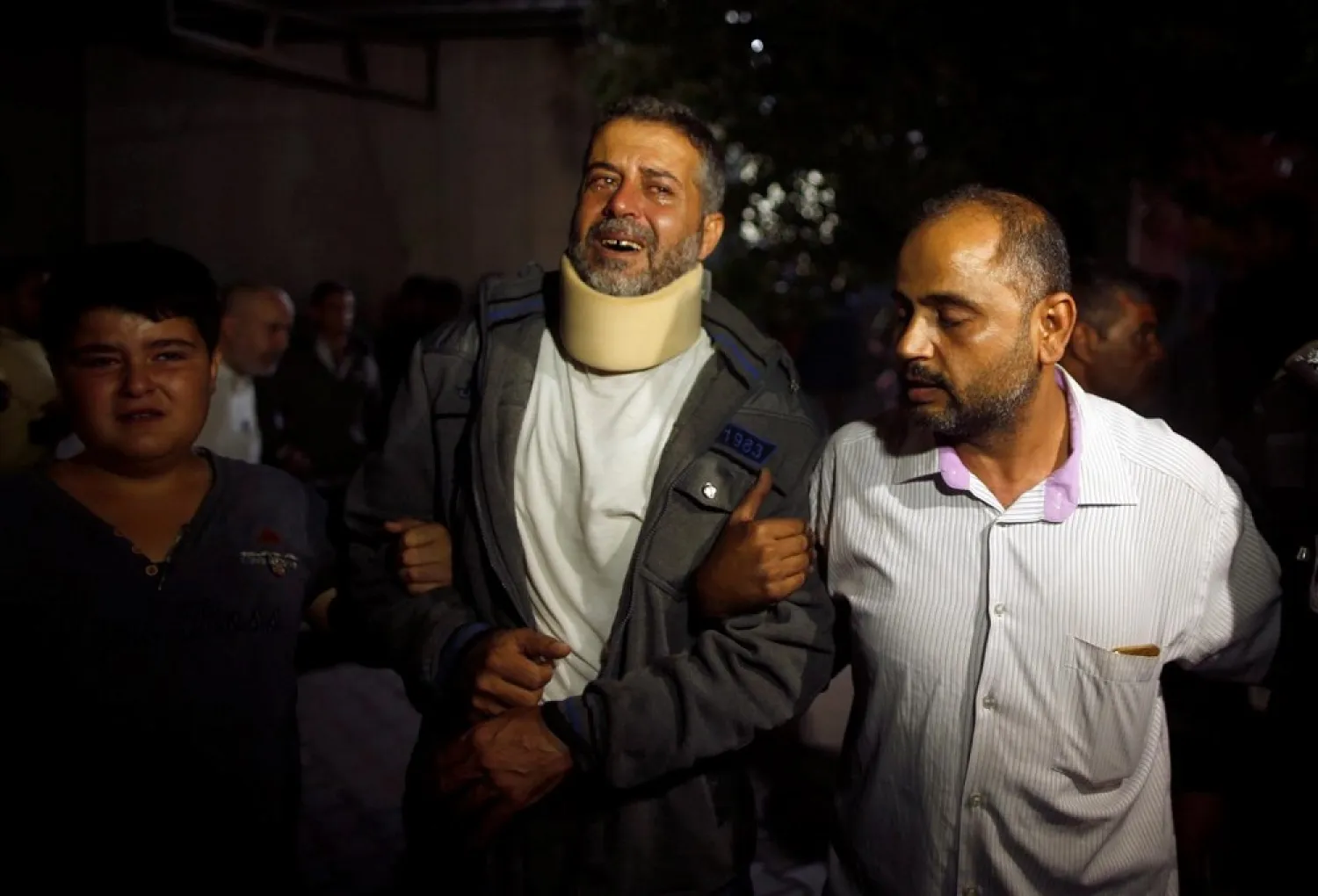 A Palestinian man at a hospital after his relative was killed near the border between Israel and central Gaza Strip October 30, 2017. (Reuters)
