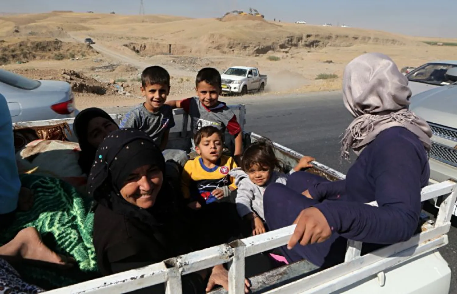People return back to Kirkuk, 290 kilometers (180 miles) north of Baghdad, Iraq October 17, 2017. (AP)