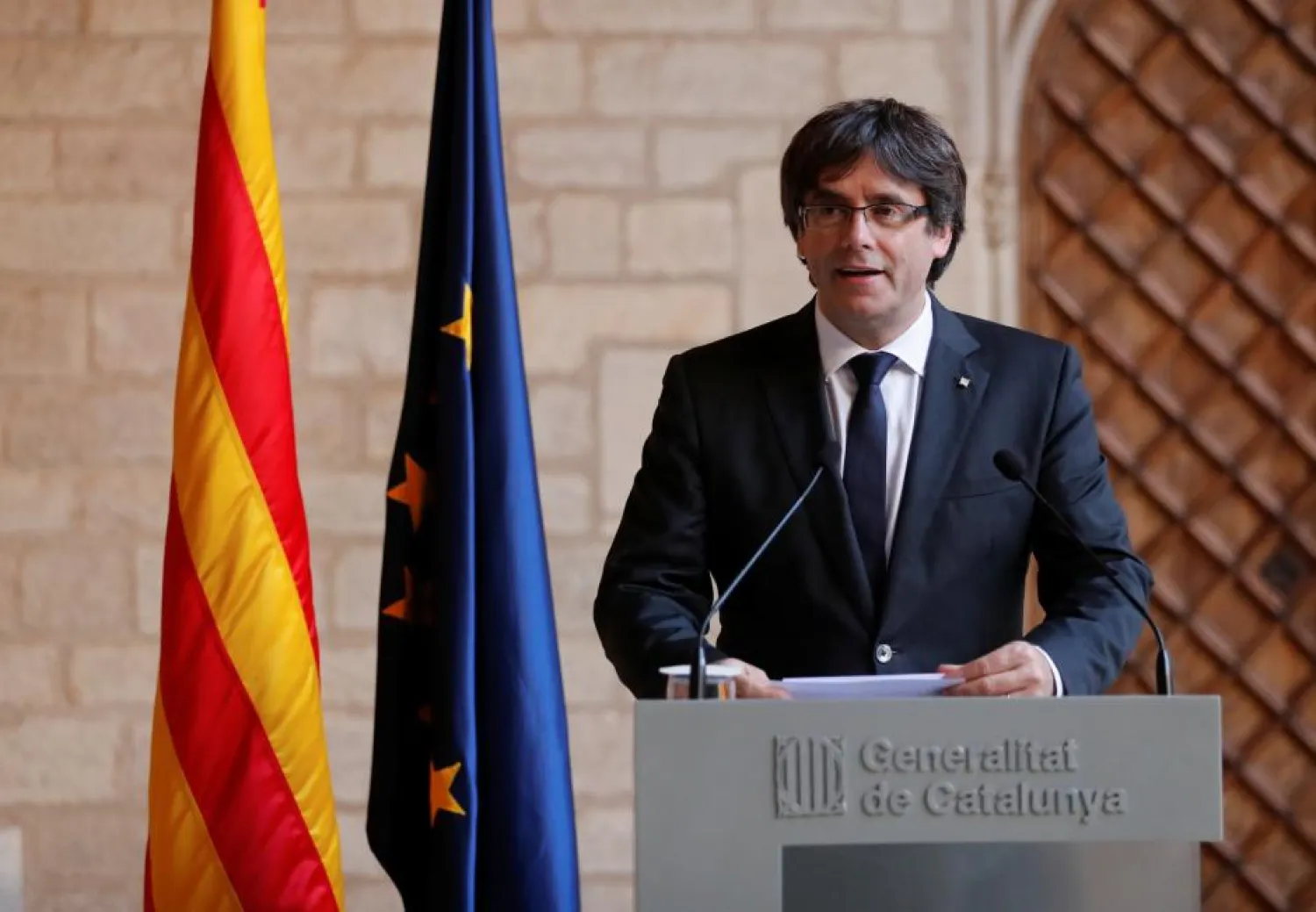 Sacked Catalan President Carles Puigdemont delivers a statement at the regional government headquarters, in Barcelona, Spain, October 26, 2017. (Reuters)