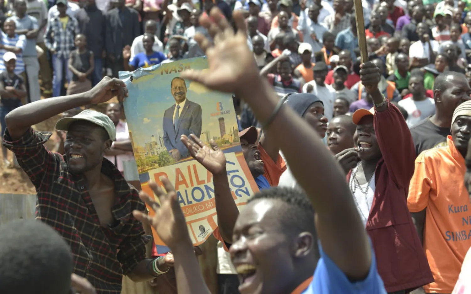 Supporters of Kenyan opposition leader Raila Odinga react as they listen to his address in Nairobi slum of Kawangware on October 29, 2017. (AFP)
