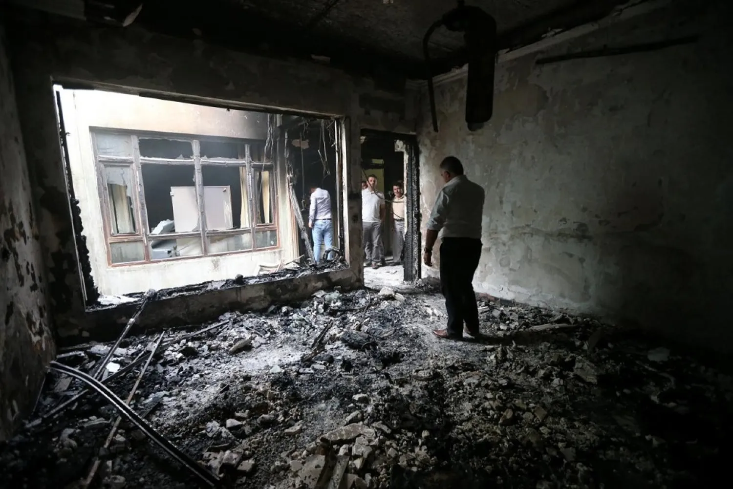The Patriotic Union of Kurdistan (PUK) building is seen after it was burnt overnight, in the town of Zakho, Iraq October 30, 2017. (Reuters)