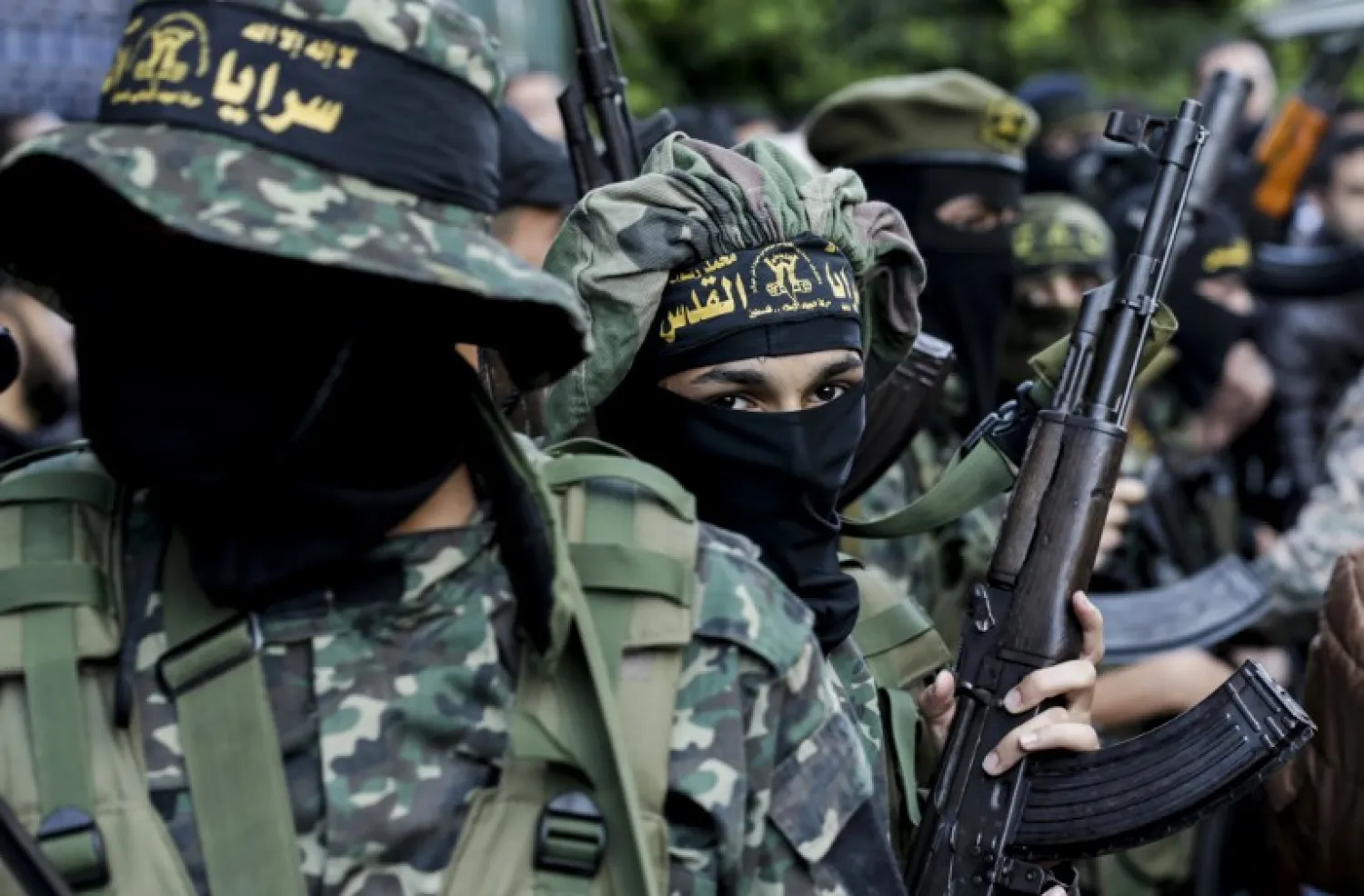 Members from the Islamic Jihad Movement in Palestine attend the funeral of fellow members killed in an Israeli operation to blow up a tunnel stretching from the Gaza Strip into Israel during their funeral at the Bureij refugee camp, in central Gaza, on October 31, 2017. (MAHMUD HAMS / AFP)