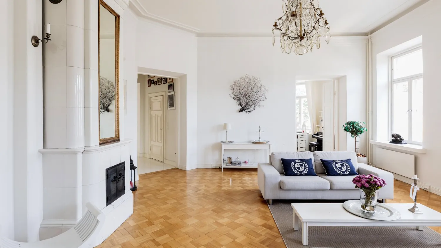 This four-bedroom apartment is in a building with 27 units. The living room has parquet floors and 13-foot ceilings. Tuomas Uusheimo for The New York Times.