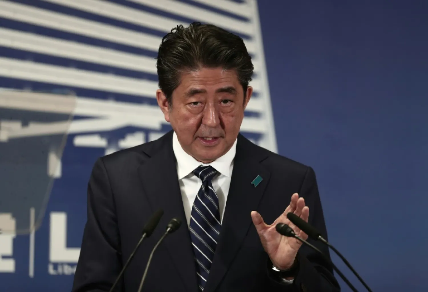 Japan's Prime Minister Shinzo Abe attends a  press conference a day after his landslide election victory. AFP / Behrouz MEHRI 