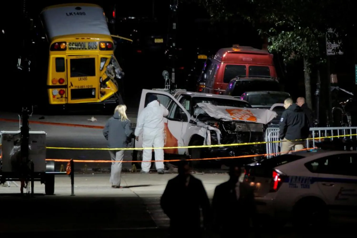 Police investigate a pickup truck used in an attack on the West Side Highway in Manhattan, New York, US, November 1, 2017. REUTERS/Andrew Kelly 