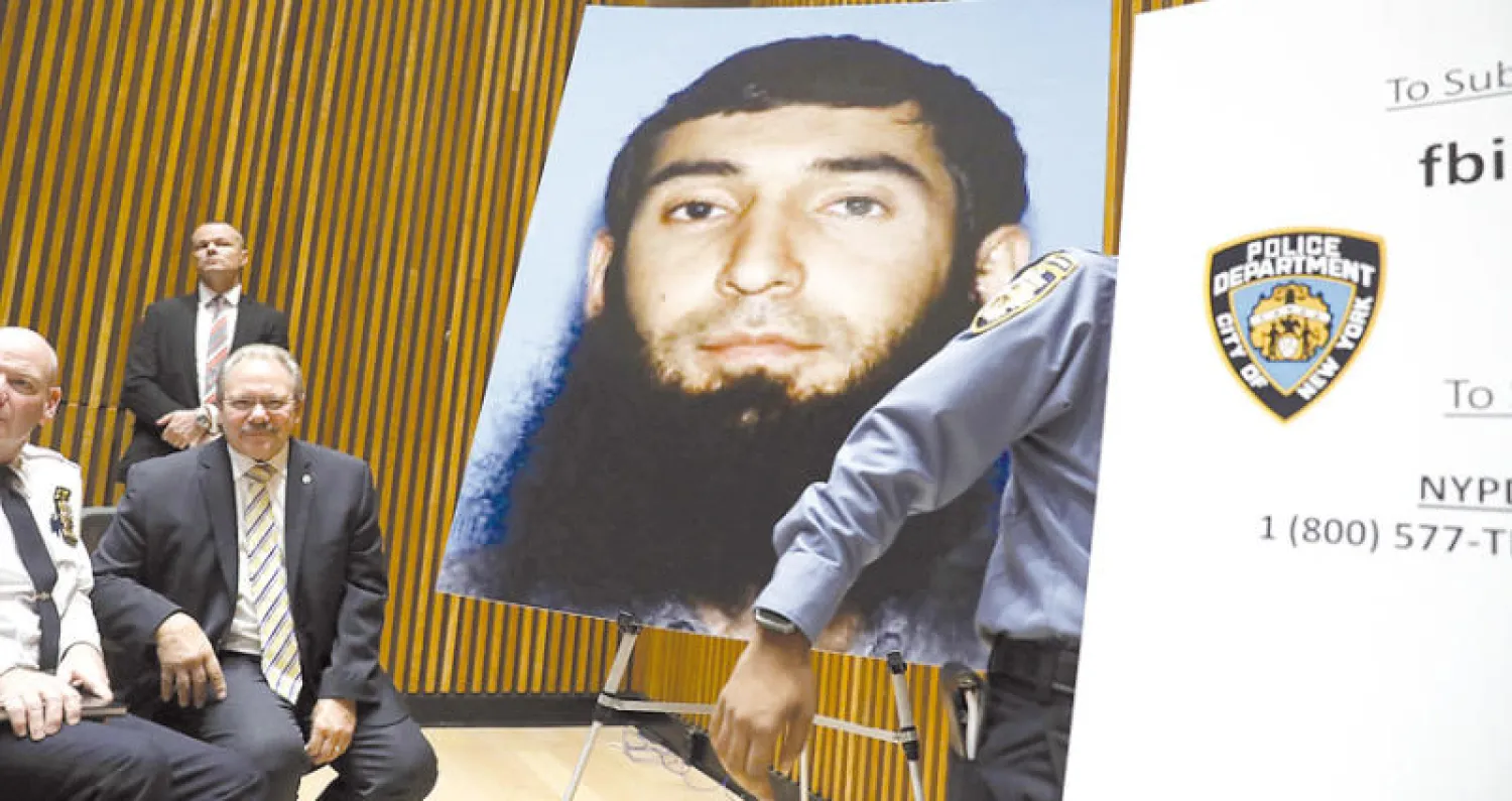 صورة إرهابي نيويورك داخل قاعة مؤتمر صحافي للإفصاح عن آخر تطورات هجوم منهاتن (أ.ف.ب)