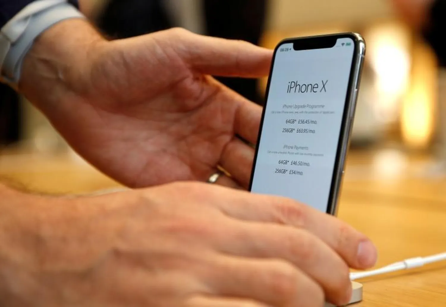 Apple's new iPhone X is displayed after it goes on sale at the Apple Store in Regents Street, London, Britain, November 3, 2017. REUTERS/Peter Nicholls
