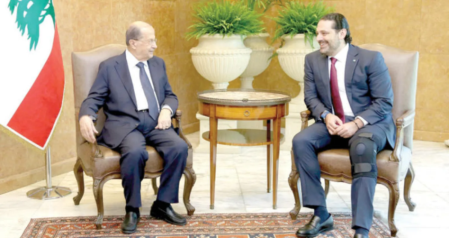 عون والحريري... والتسوية التي أتت برئيس جمهورية بعد ثلاث سنوات من الفراغ الرئاسي في لبنان (رويترز)