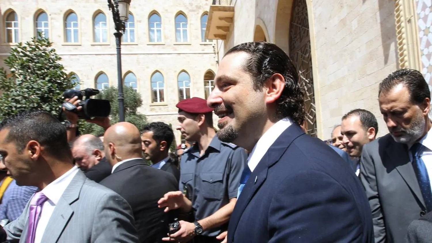 Former Lebanese Premier Saad Hariri leaves the Grand Serail government palace in Beirut in 2014 following a meeting with then PM Tammam Salam. (AFP)