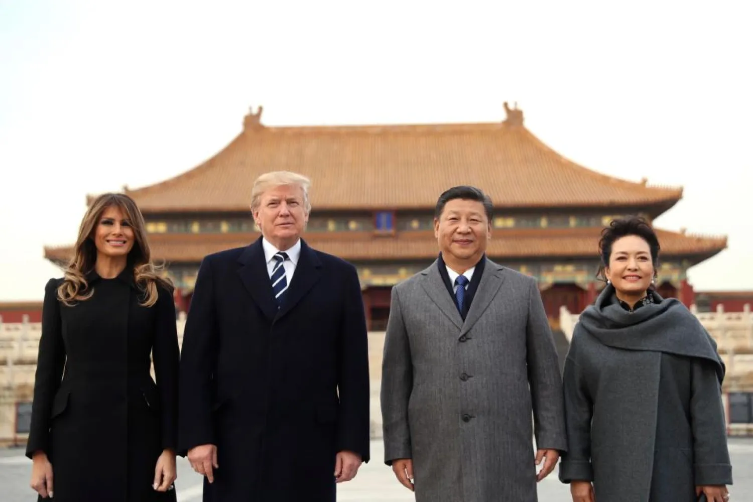 US President Donald Trump and his wife Melania are given a tour of the Forbidden City in Beijing by Chinese President Xi Jinping and his wife Peng Liyuan (AP)