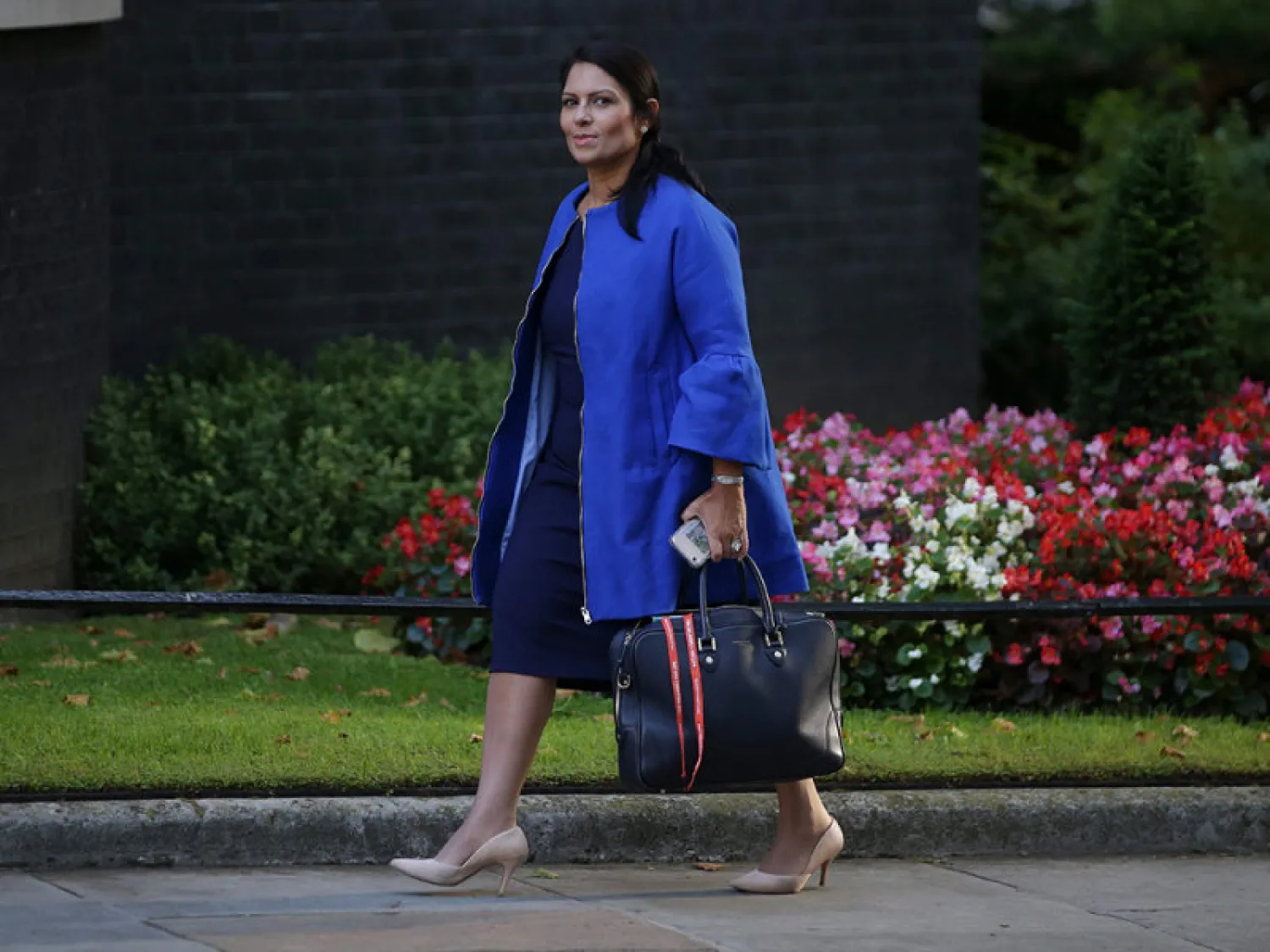 Britain's International Development Secretary Priti Patel arriving to attend the weekly meeting of the cabinet at Downing Street in central London. DANIEL LEAL-OLIVAS/AFP/Getty Images