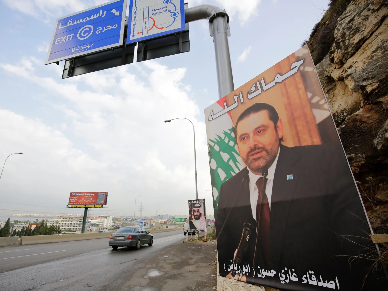 Lebanese Prime Minister Saad Hariri, who resigned last week in a televised speech from the Saudi capital, Riyadh, stares out from a poster on the side of a road in Tripoli, Lebanon.
Ibrahim Chalhoub/ AFP