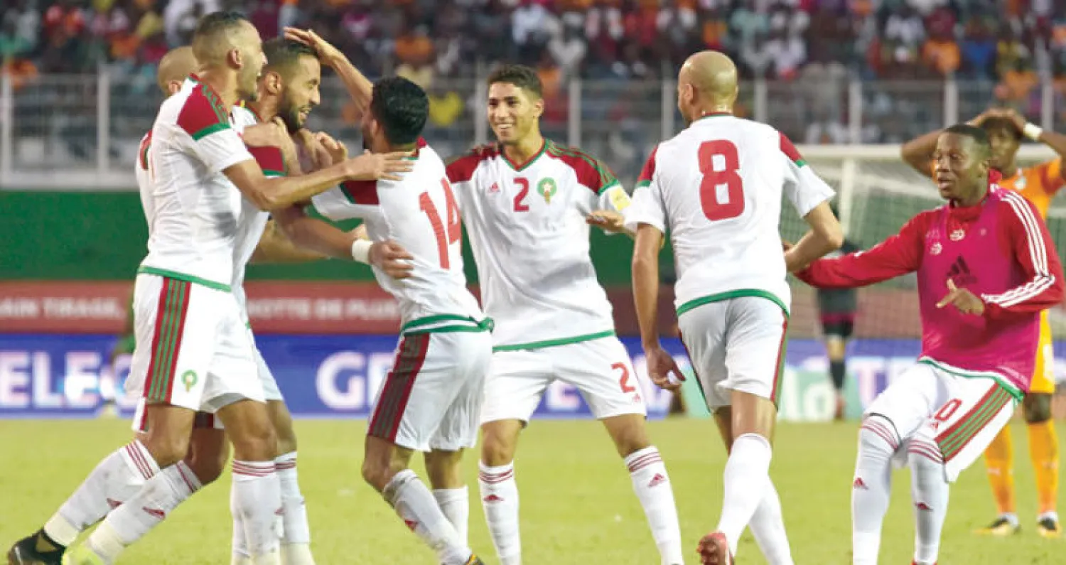 لاعبو منتخب المغرب يحتفلون بالتأهل (أ.ف.ب)