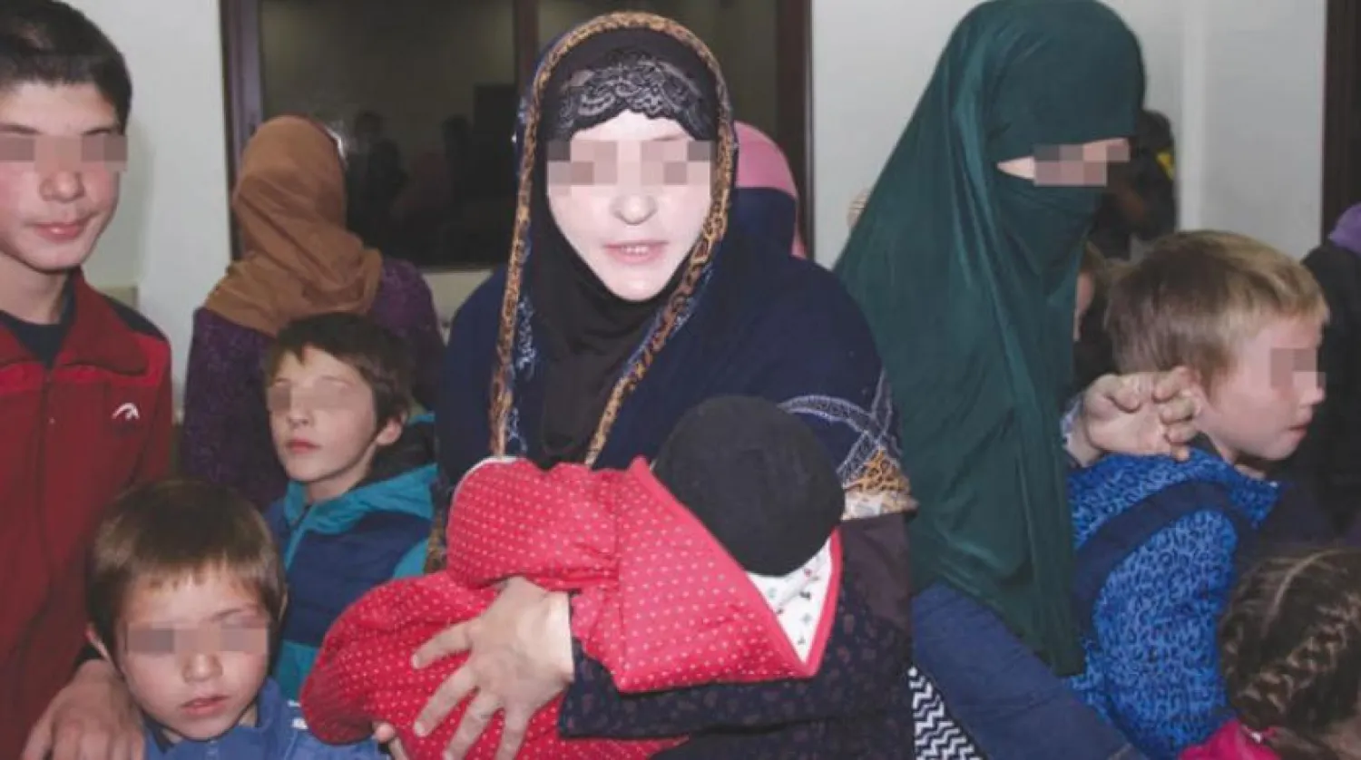 Chechen families whose fathers and husbands are suspected to have fought for ISIS. (Asharq Al-Awsat)