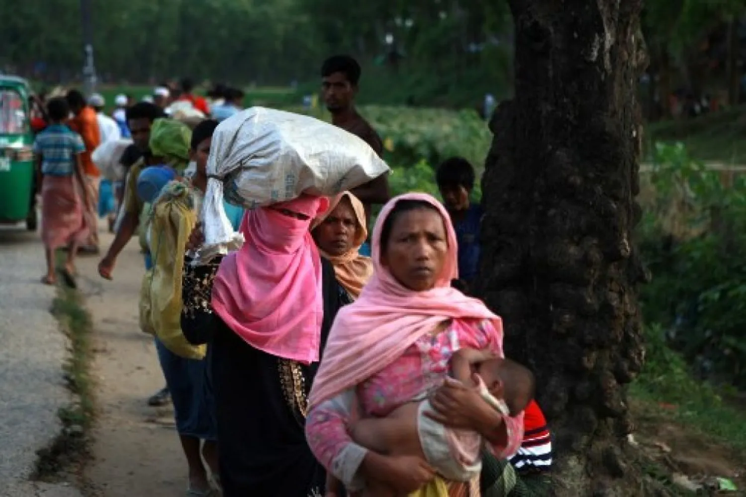 Rohingya women walking towards a camp in Ukhiya, Bangladesh. AFP file photo