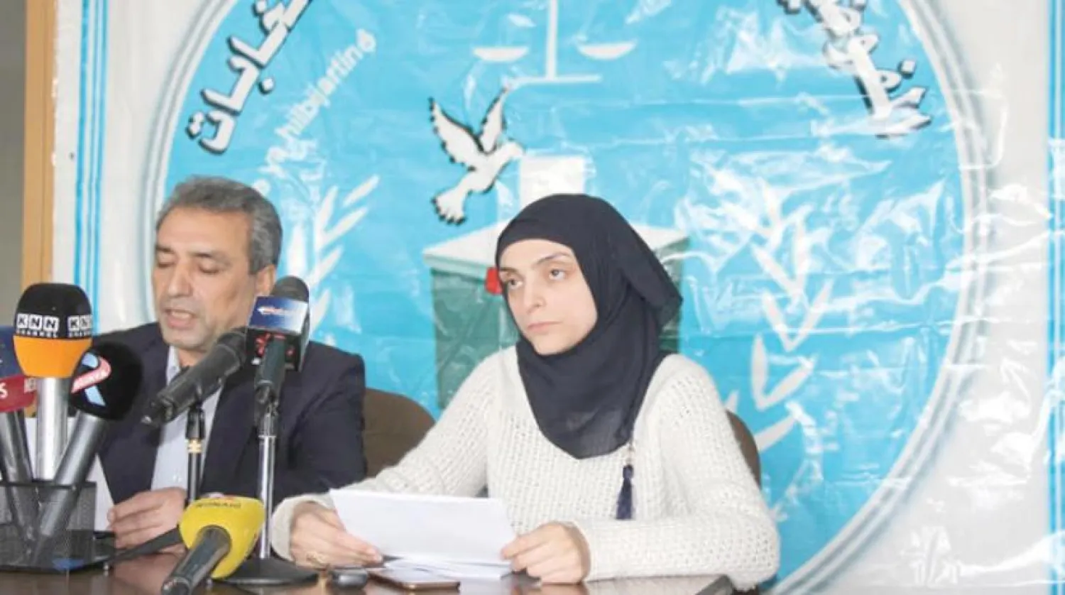 Syria’s northern federal electorate commission members partake in a press address, Syria, Asharq Al-Awsat 