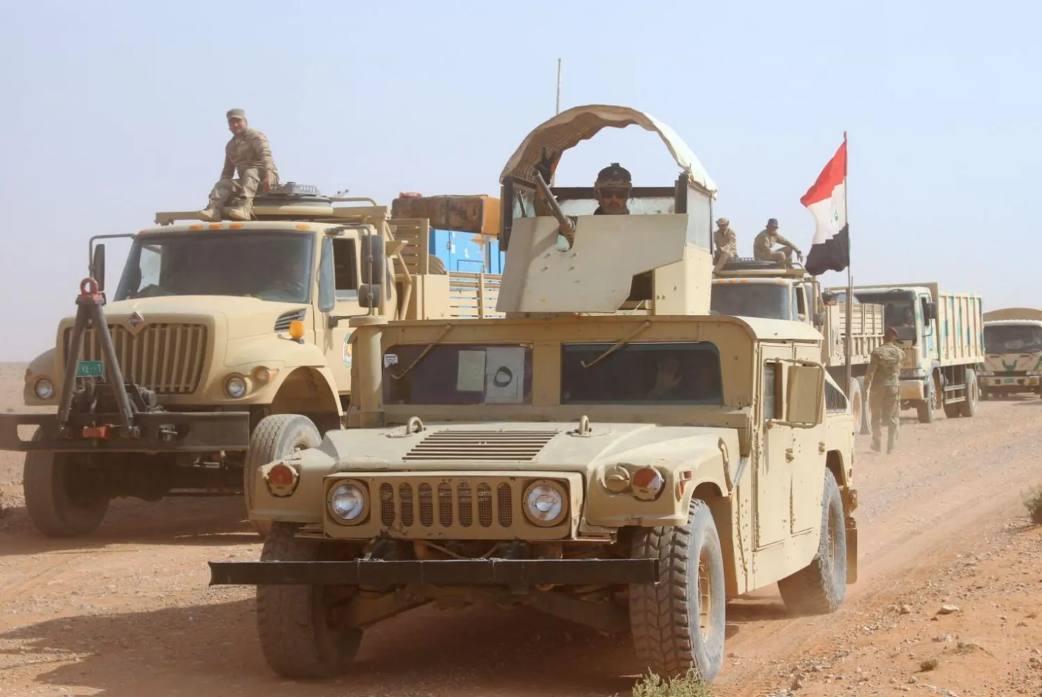 Iraqi pro-government forces advance towards the town of Rawa, on the Euphrates river, on Oct 28, 2017. AFP photo