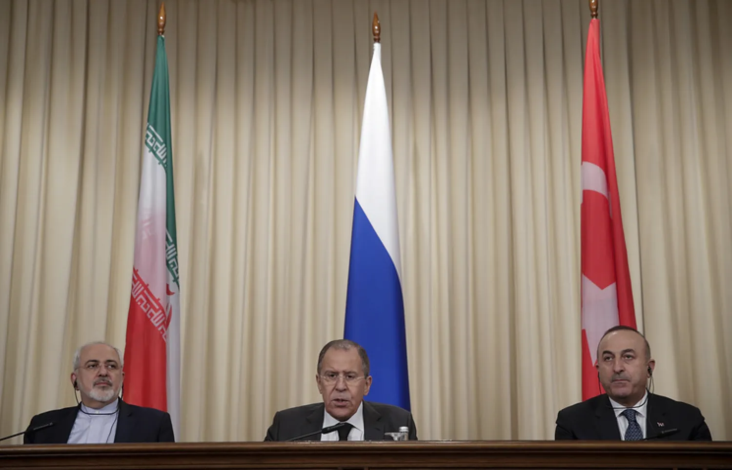 Iranian Foreign Minister Mohammad Javad Zarif, Russian Foreign Minister Sergey Lavrov and Turkey's Foreign Minister Mevlut Cavusoglu, 2016. AP Photo/Pavel Golovkin