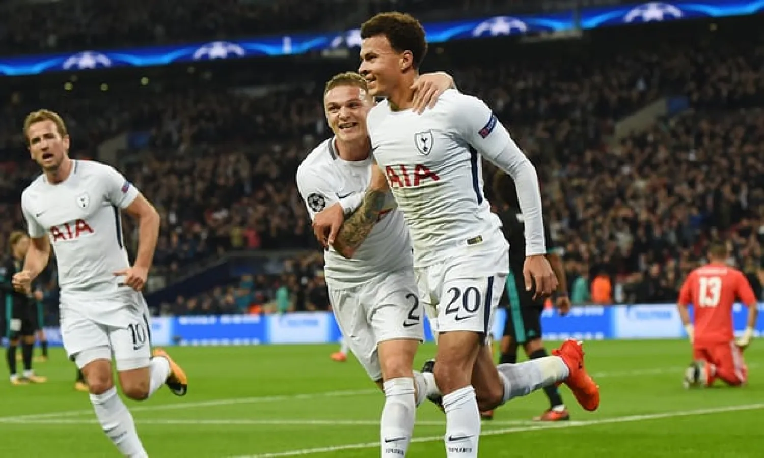  Dele Alli, right, celebrates with Kieran Trippier as Harry Kane prepares to join in - the trio examplify what Tottenham are achieving with faith in youth and good recruitment. Photograph: Andy Rain/EPA
 
