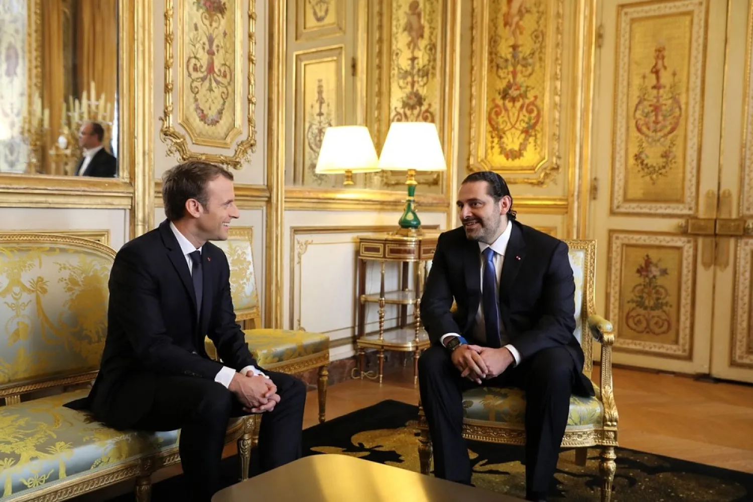 French President Emmanuel Macron receives resigned Lebanese Prime Minister Saad Hariri at the Elysee Palace. (AFP)