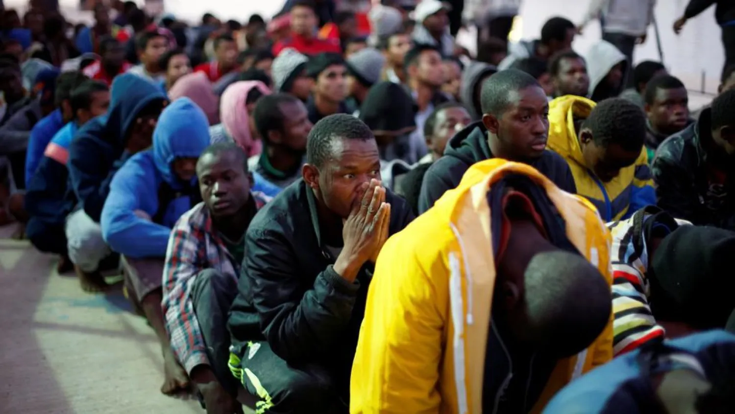 Migrants arrive at a naval base after they were rescued by Libyan Navy, in Tripoli, Libya on 4 November, 2017. PHOTO: Reuters/Ahmed Jadallah