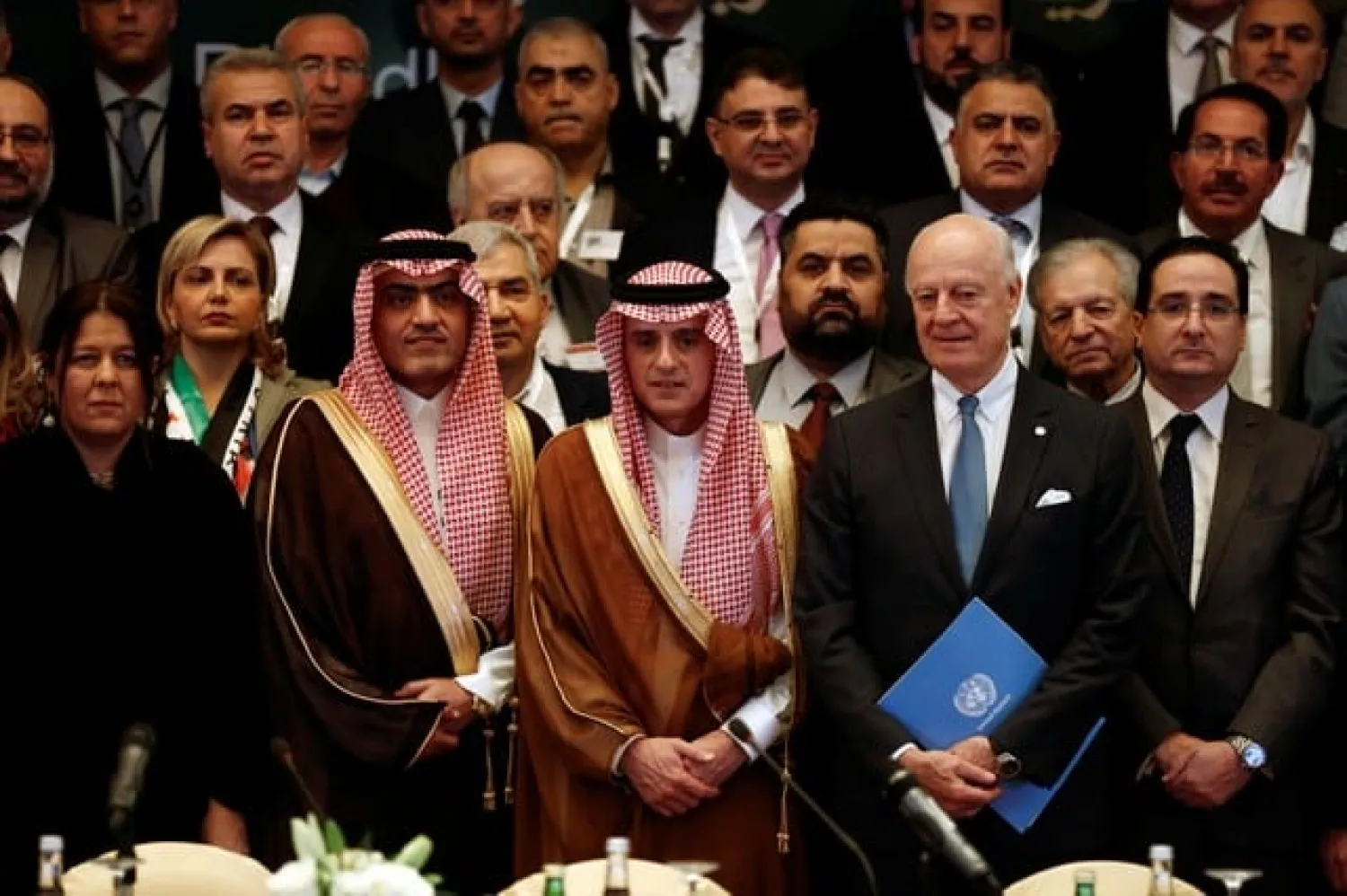 Saudi Foreign Minister Adel al-Jubeir poses for a group photo during a Syrian opposition meeting in Riyadh, Saudi Arabia. REUTERS