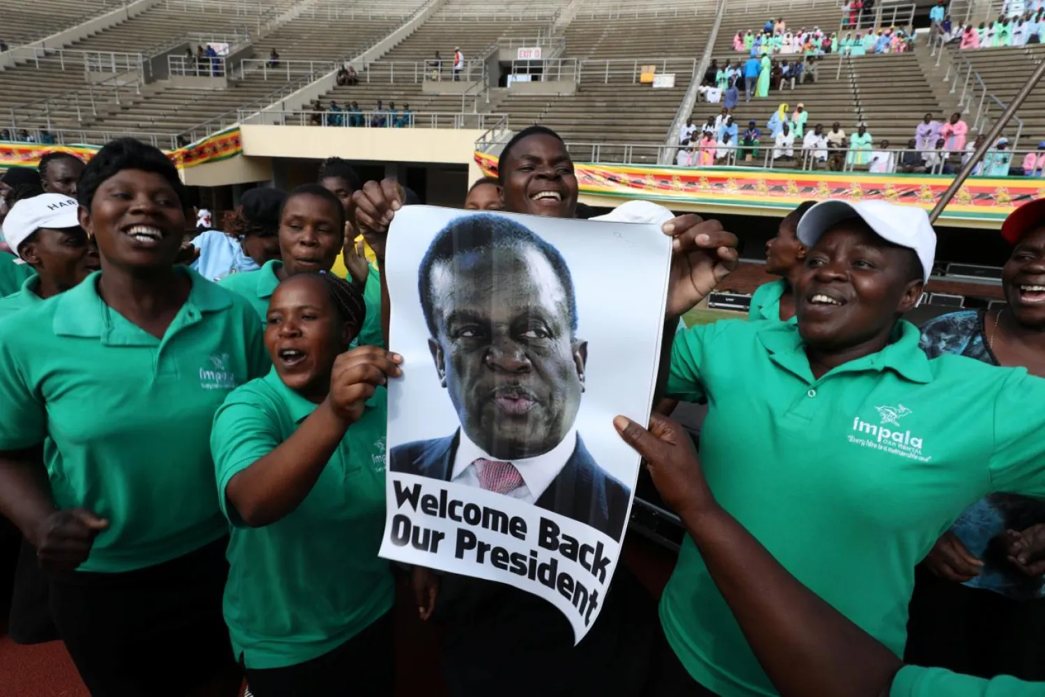 People wait for the inauguration ceremony to swear in Zimbabwe's former vice president Emmerson Mnangagwa as president in Harare, Zimbabwe, November 24, 2017. REUTERS/Mike Hutchings
