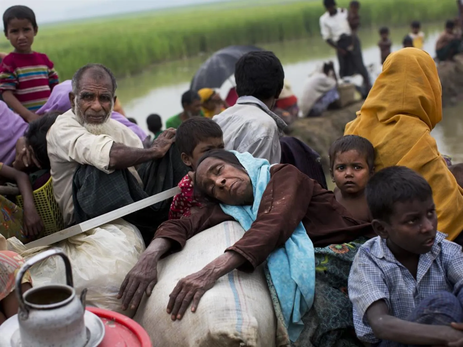 Rohingya refugees wait to cross into Bangladesh. AP file photo