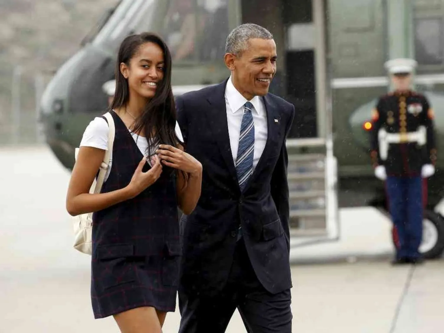 Former US President Barack Obama and his daughter Malia in 2016. (Reuters)