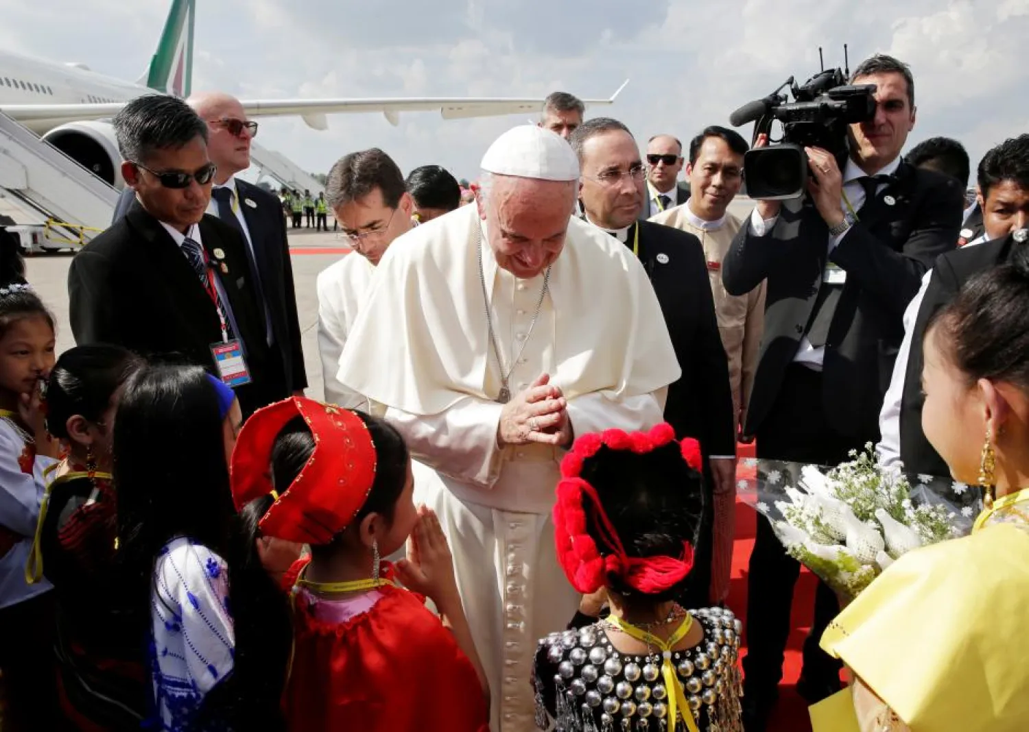 Pope Francis is welcomed as he arrives at Yangon International Airport, Myanmar November 27, 2017. (Reuters)