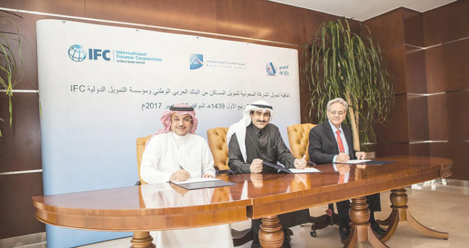 الشلاش والمرشد وعيد بعد توقيع الاتفاقيات («الشرق الأوسط»)