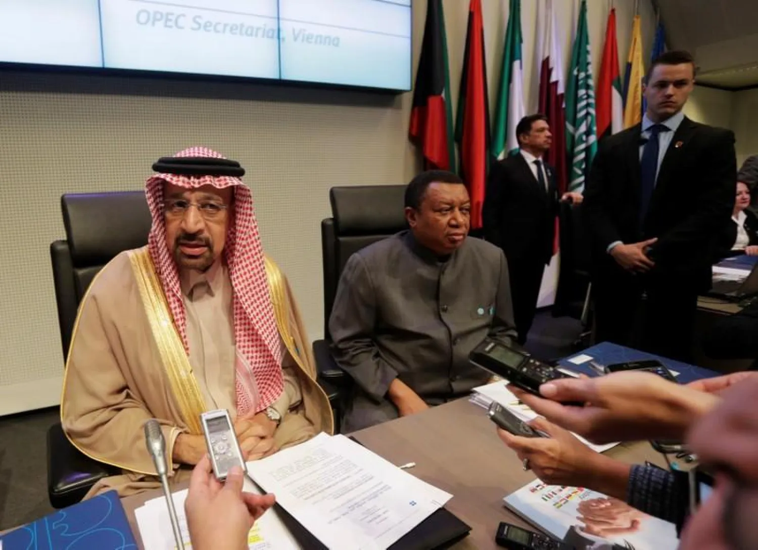 Saudi Arabia’s Oil Minister Khalid al-Falih sits next to OPEC Secretary General Mohammad Barkindo as he talks to journalists at the beginning of an OPEC meeting in Vienna, Austira, November 30, 2017. (Reuters/Heinz-Peter Bader)