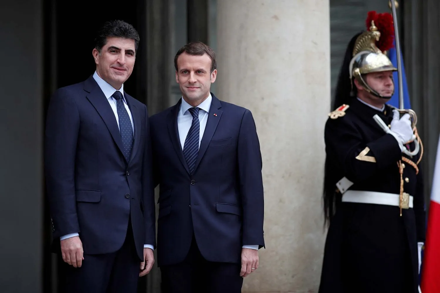 French President Emmanuel Macron meets Kurdish Prime Minister Nechirvan Barzani in Paris. (Reuters)
