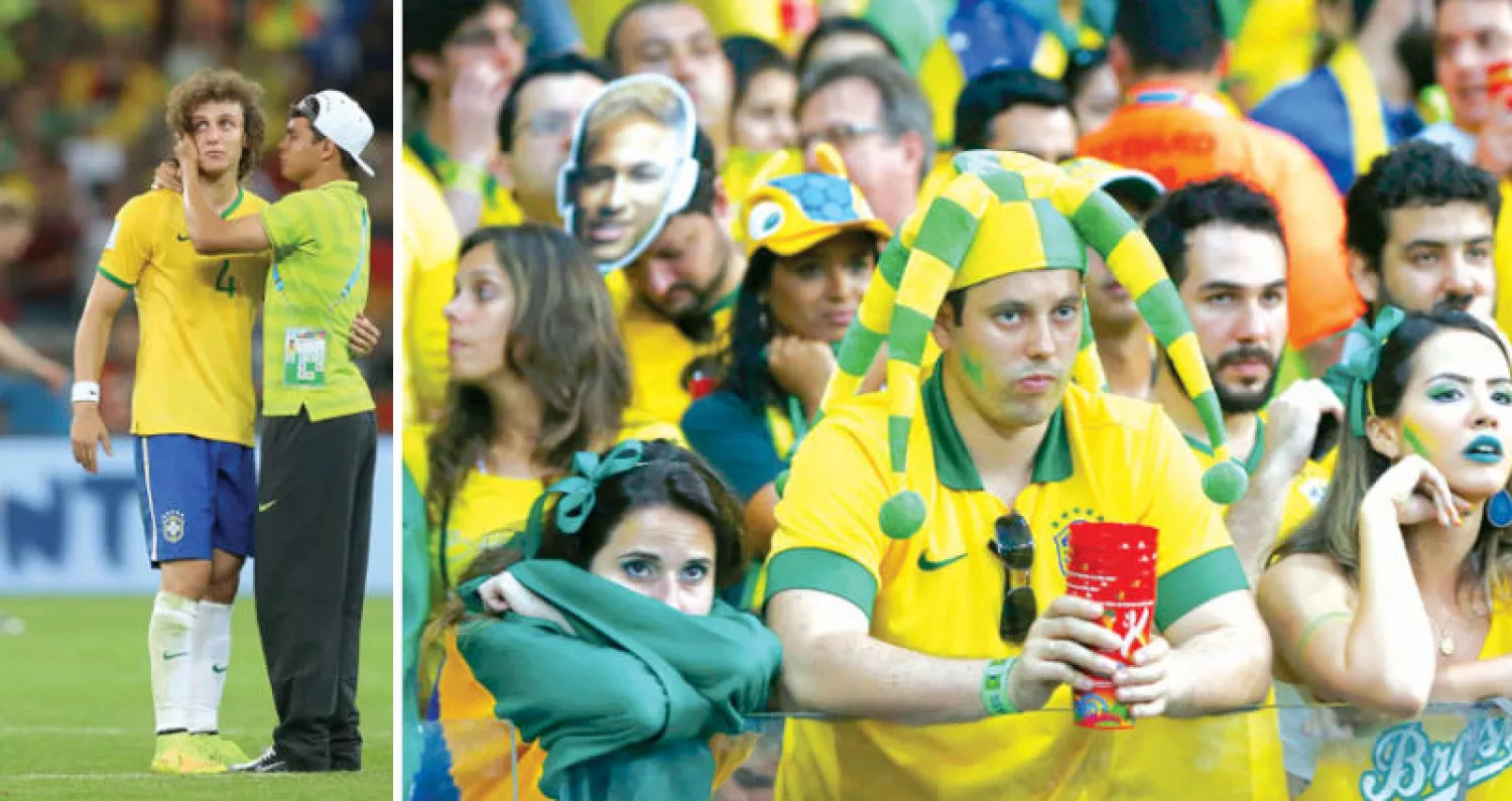 مشجعو البرازيل في نصف نهائي مونديال 2014 («الشرق الأوسط»)  -  تياغو سيلفا وديفيد لويز بعد السباعية الألمانية («الشرق الأوسط»)