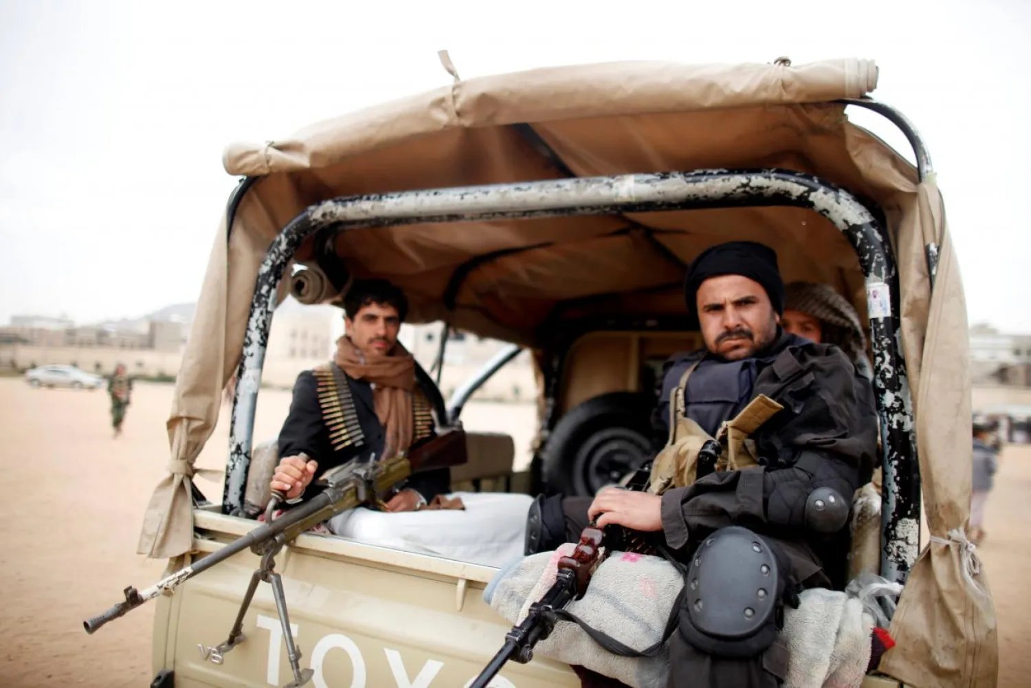 Houthi militants ride on the back of a patrol truck in Sana'a, Yemen. Reuters photo