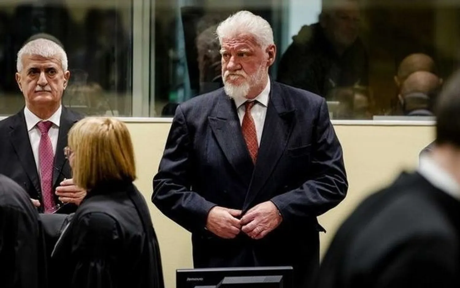 Croatian former general Slobodan Praljak (C) arrives at the International Criminal Tribunal for the former Yugoslavia (ICTY) (PHOTO: Getty)