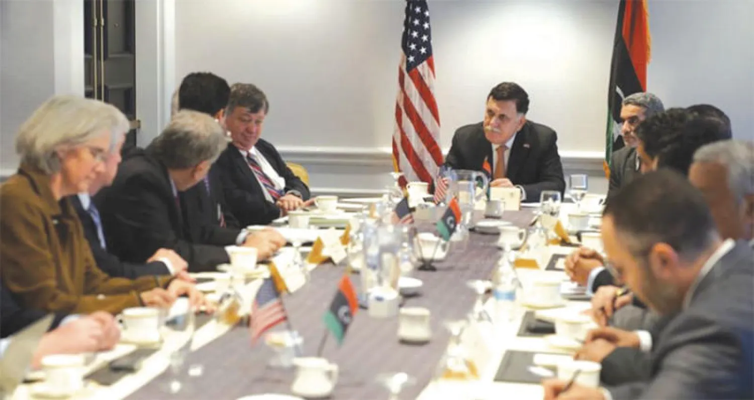 صورة وزعها مكتب السراج للقائه في واشنطن مع منظمات أميركية تهتم بشؤون الانتخابات