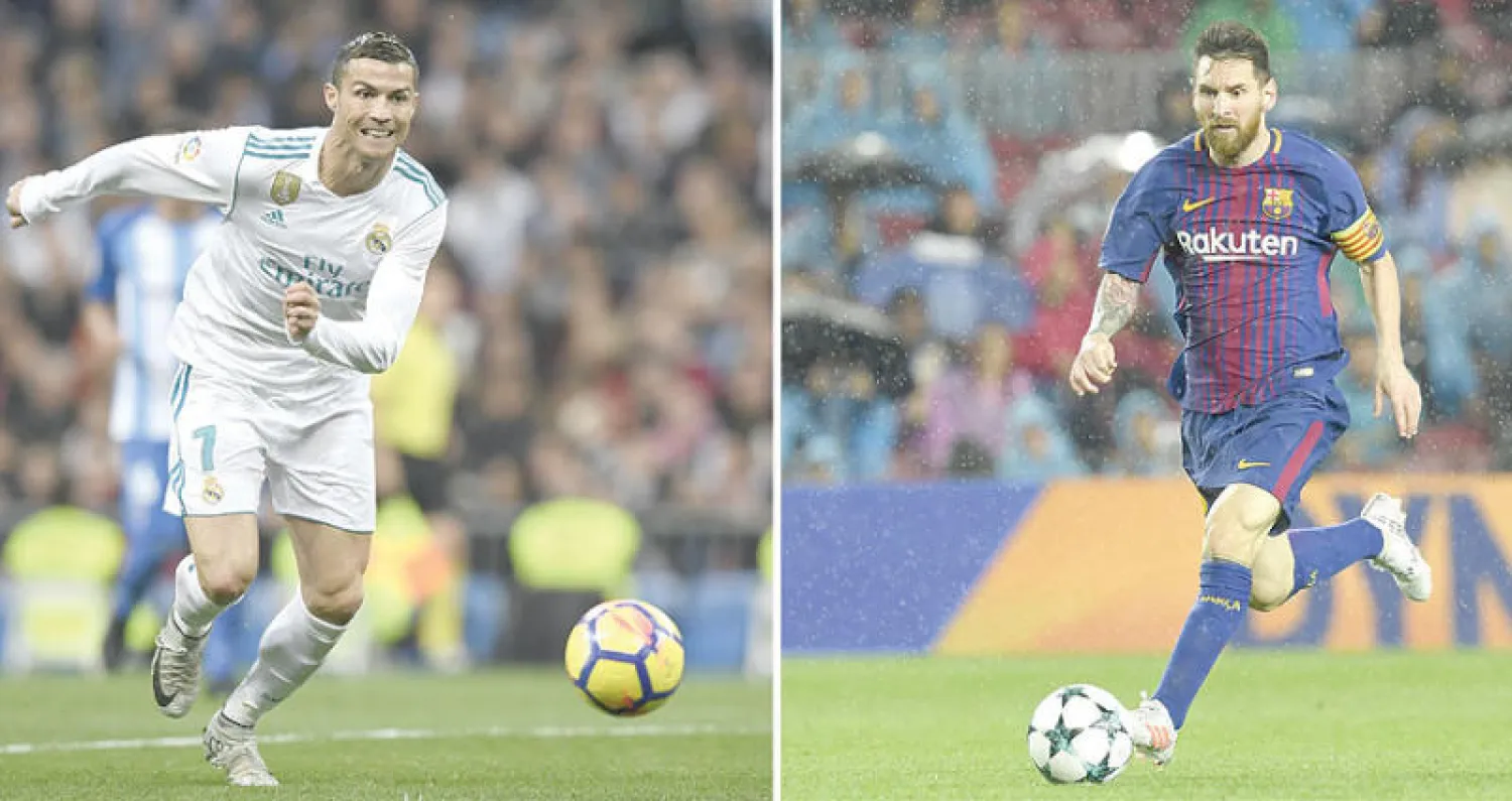 رونالدو مرشح للفوز بالجائزة وميسي يأمل في حصدها رغم أنه خارج دائرة الترشيحات (أ.ف.ب)
