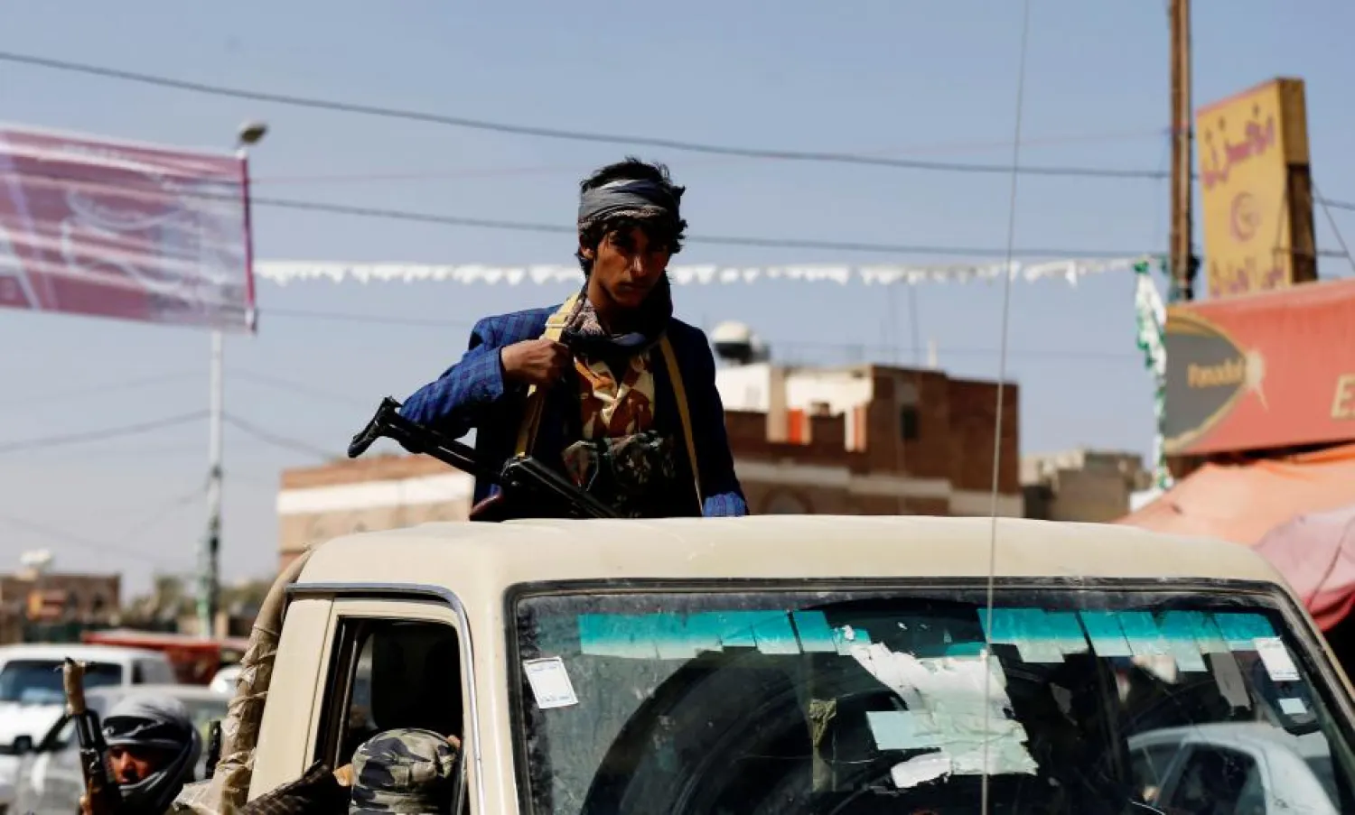 A Houthi rebel rides on the back of a truck as clashes with forces loyal to Yemen's former president Ali Abdullah Saleh continue in Sanaa, Yemen December 4, 2017. REUTERS/Khaled Abdullah
