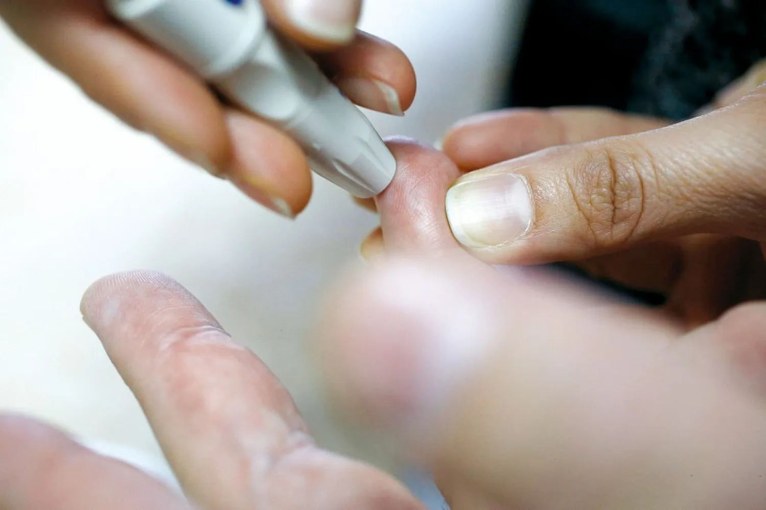 Pricking the finger to check blood sugar may become a thing of
the past. Photo: Reuters