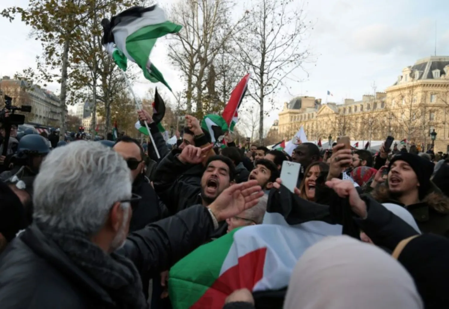 Demonstrators in Paris rally against Israeli PM Netanyahu's visit to the French capital on Sunday. (AFP)