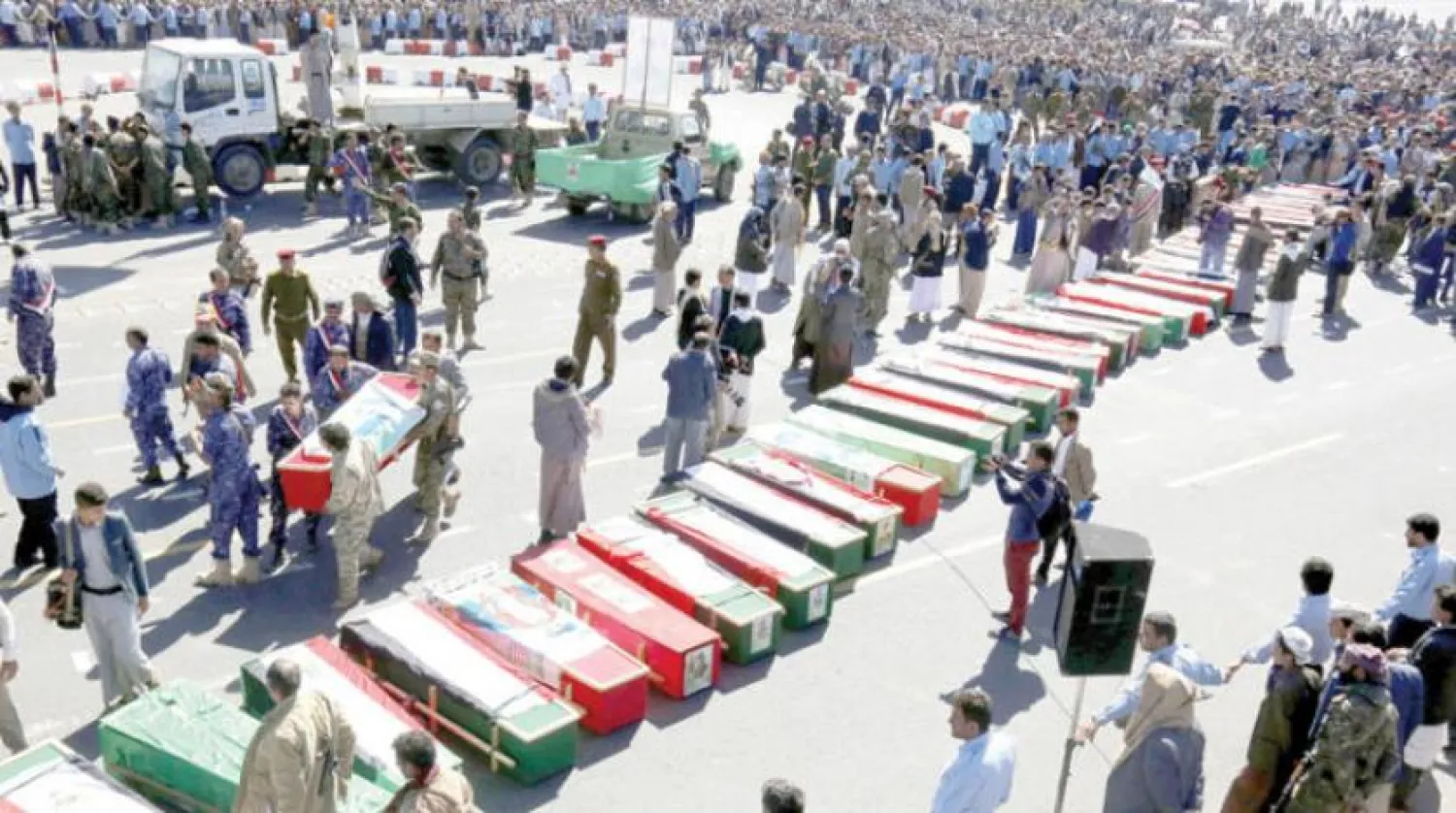 Houthis at a mass funeral of those killed in  clashes with the pro-Saleh forces, EPA