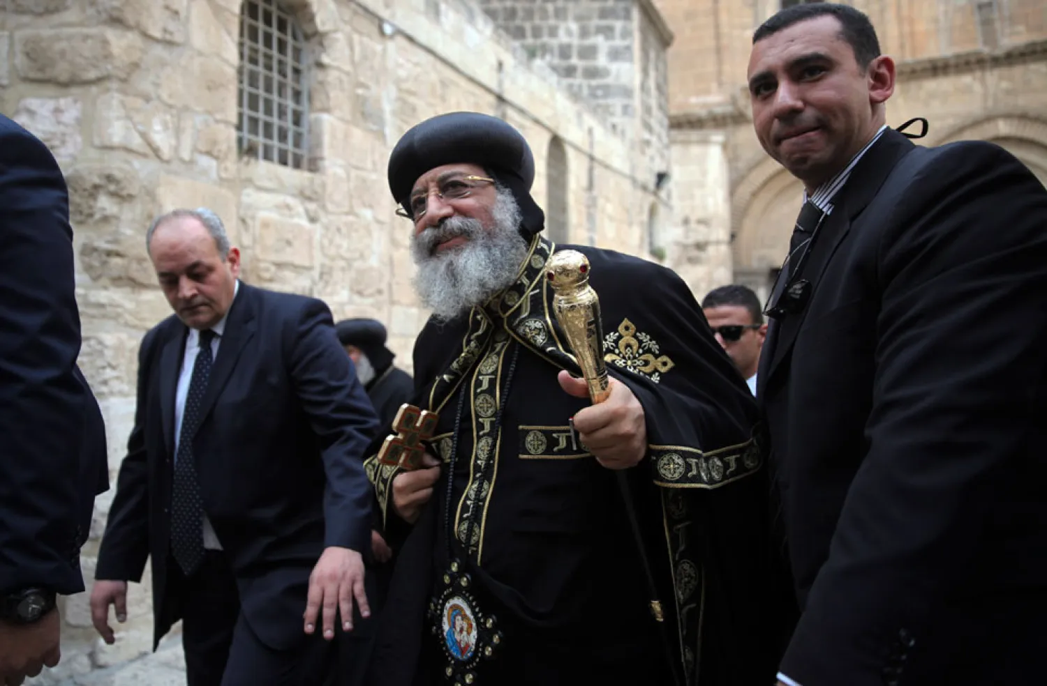 The leader of Egypt's Coptic Church Pope Tawadros II walks outside the Church of Holy Sepulcher in Jerusalem in 2015. (AP)