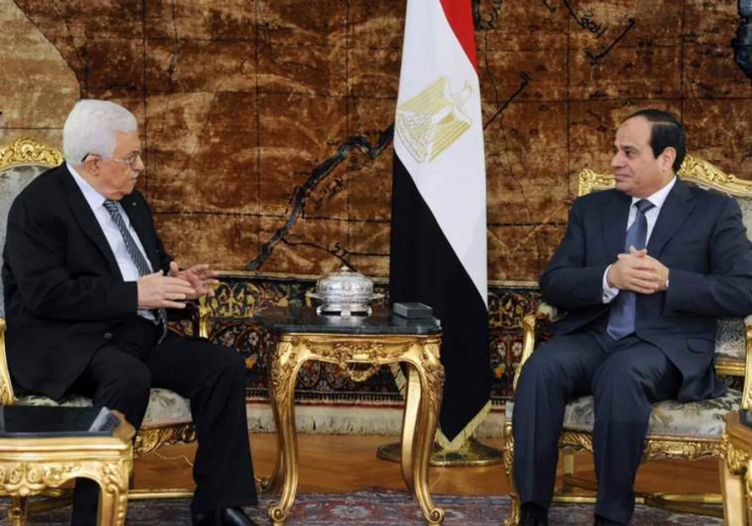  Egyptian President Abdel Fattah el-Sisi (R) meets with Palestinian President Mahmoud Abbas in Cairo, January 14, 2015. (photo credit: REUTERS)
