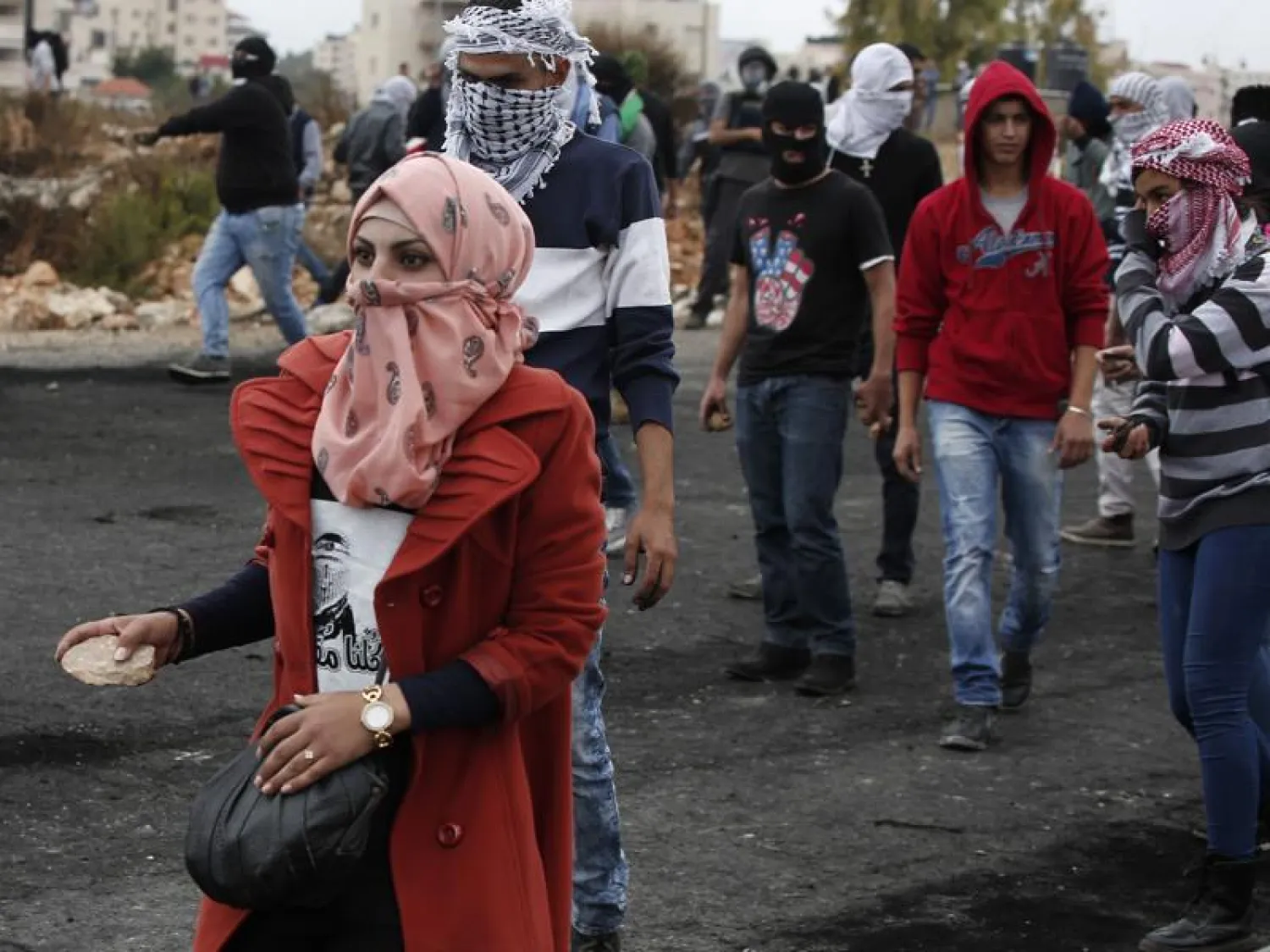 Palestinian stone throwers clash with Israeli forces in Beit El. AFP file photo