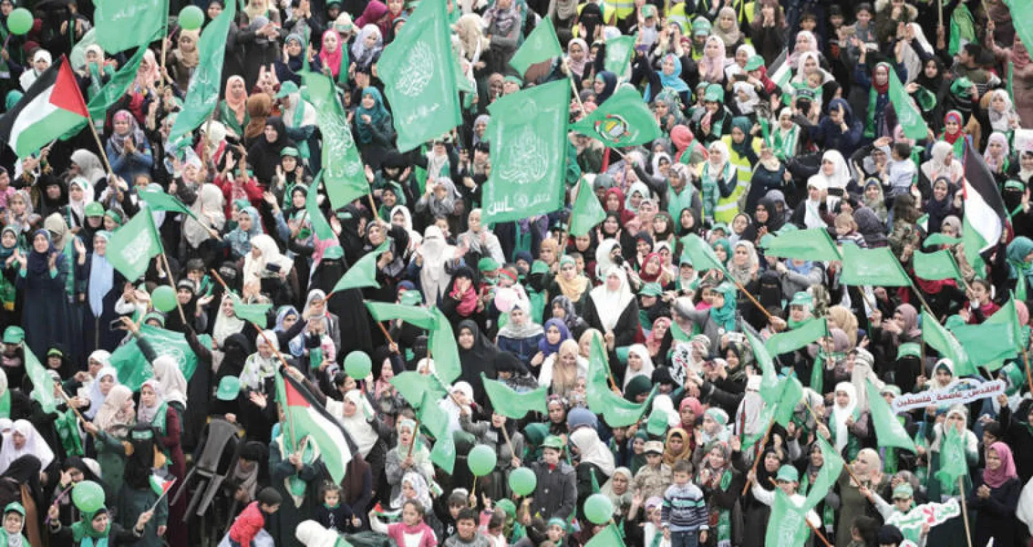 جانب من احتفالات حركة حماس بذكرى انطلاقتها الثلاثين في غزة أمس (إ.ب.أ)