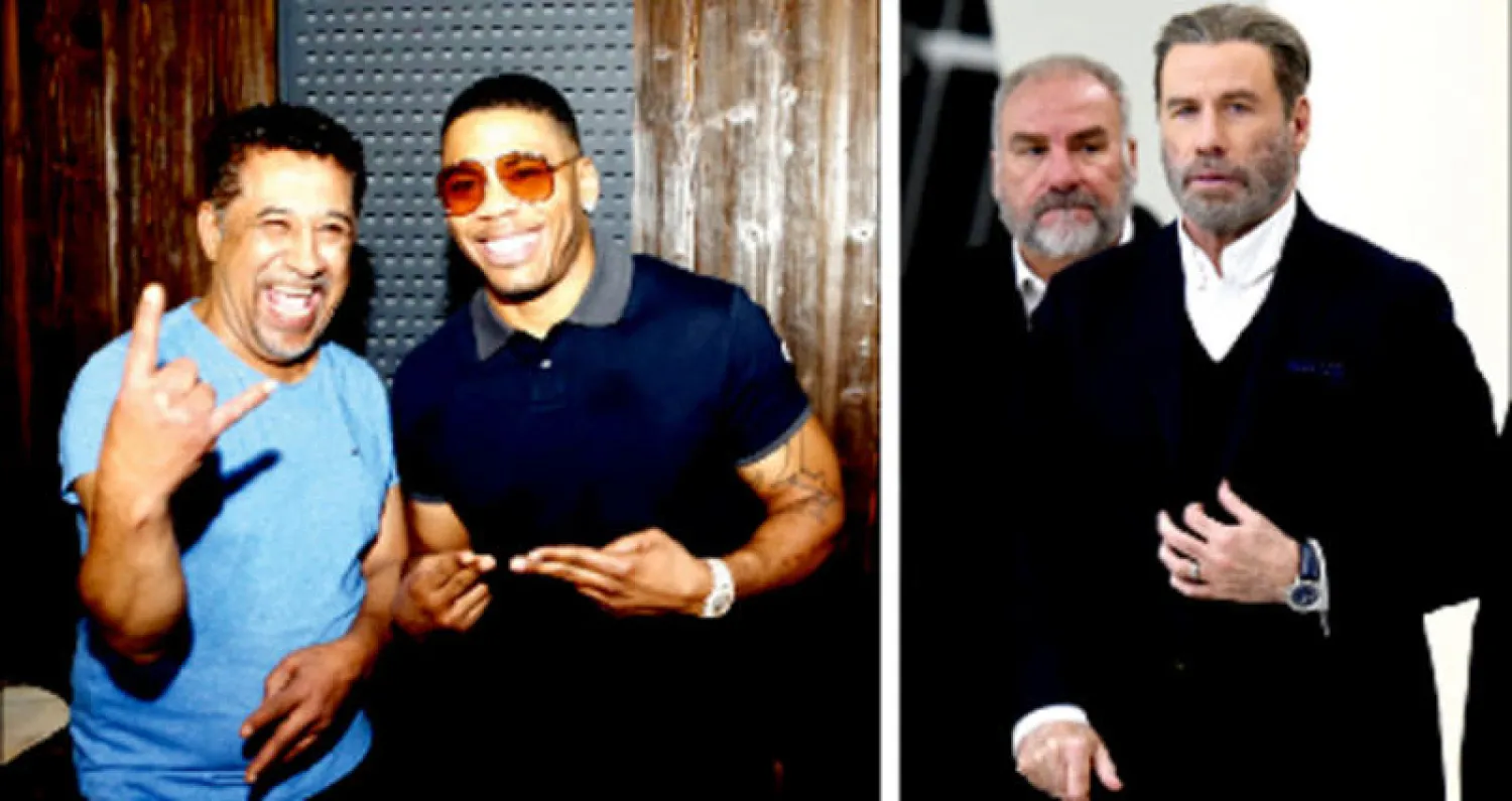 الممثل الأميركي جون ترافولتا قبل الندوة التي أقامها في الرياض أمس (أ.ف.ب) - الشاب خالد مع مغني الراب الأميركي نيللي قبل حفلهما الغنائي في جدة أول من أمس (أ.ف.ب)