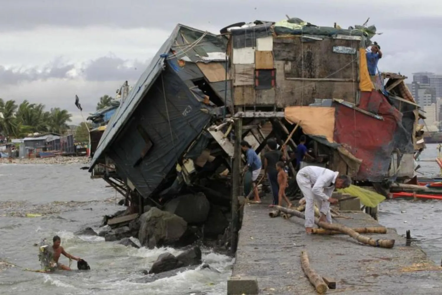Some 26 people were killed and 23 missing in the Philippines due to landslides triggered by Tropical Storm Tropical Storm Kai-Tak. (Reuters)