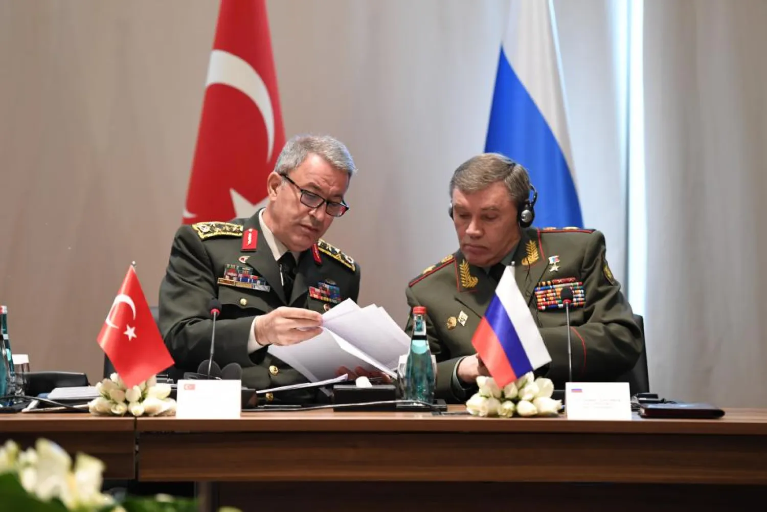 Turkey's Chief of Staff General Hulusi Akar chats with Russian Armed Forces Chief of Staff Valery Gerasimov during a meeting in Antalya, Turkey March 7. (Reuters)